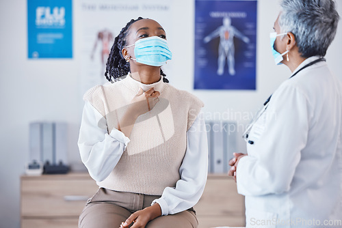 Image of Consultation, doctor and patient with face mask, throat pain and covid healthcare advice at clinic. Black woman consulting medical professional, health care check and faq, info and help at hospital.