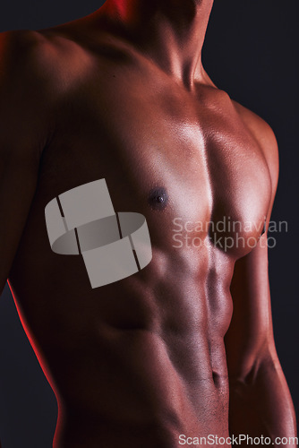 Image of Beauty, closeup and abs of man in studio for fitness, muscle and bodybuilder. Natural, workout and diet with abdomen of male model on black background for six pack, exercise and training