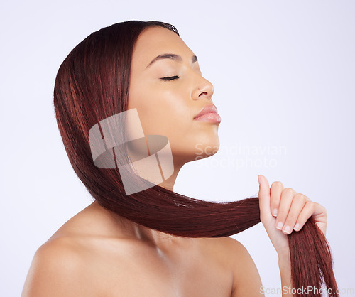 Image of Girl holding hair, beauty and care for straight hairstyle, luxury salon shine isolated on white background. Haircare, haircut and face of Brazilian model with hands on studio backdrop with mockup.