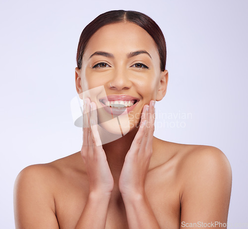 Image of Woman portrait, natural beauty and skincare in a studio with happiness and smile from dermatology. Skin glow, facial and cosmetics of a female model feeling happy from self care and face wellness