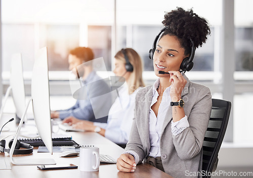 Image of Call center, customer support and woman consultant working on online consultation in the office. Crm, business and professional African female telemarketing or sales agent with headset in workplace.