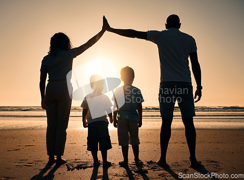 Image of Family silhouette at the beach during sunset, people with safety and security, parents protect children while outdoor. Mom, dad and kids in nature, back and ocean view with love, care and support