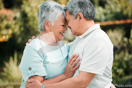 Image of Happy senior couple, face touch and hug in park, garden and peace of care, happiness and love together. Elderly man, woman and retirement of marriage partner, relax or smile of quality time in nature