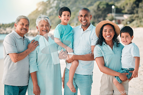 Image of Family, parents and grandparents portrait at beach and children with a smile, happiness and care together. Happy boy kids, men and women on holiday, adventure or vacation outdoor for summer travel