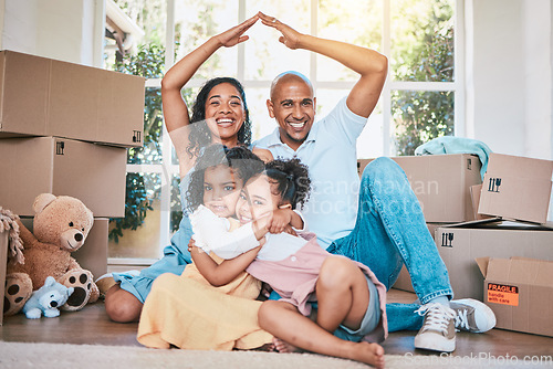 Image of Roof, new home portrait and happy family hug, moving boxes into real estate property or relocation house. Safety protection, insurance and parents with kids bonding, relax and embrace in apartment