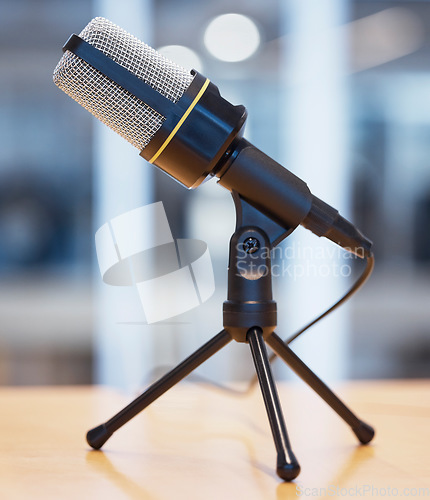 Image of Music, podcast and radio with microphone in office for live streaming, recording and interview. Technology, network and news with equipment on desk in studio for communication, media and audio