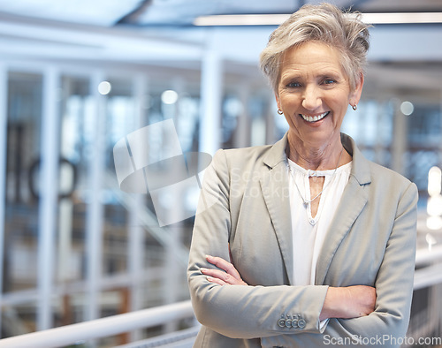 Image of Portrait, smile and business woman with arms crossed in office with pride for career, job or occupation. Ceo, senior boss or happy, proud or confident entrepreneur, person or professional from Canada