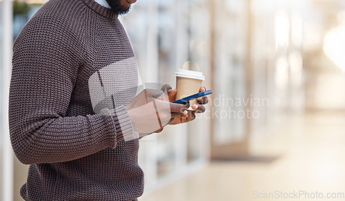 Image of Hands, coffee and texting with phone in office, social media or typing in workplace mockup. Cellphone, tea and black man or business person browsing online, networking or internet messaging on break.