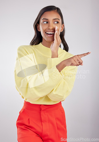 Image of Pointing whisper, gossip and a woman bully isolated on a white background in a studio. News, talking and a young corporate worker whispering a secret, information or gossiping about an employee