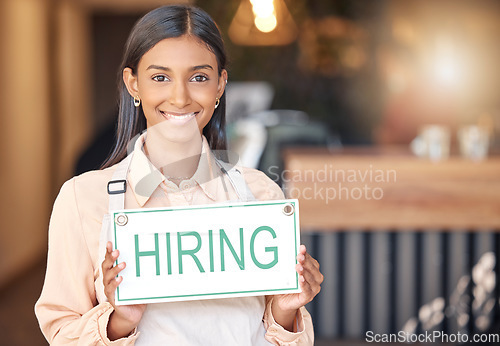 Image of Woman, hiring sign or portrait smile in small business for recruitment, hire or job opportunity at cafe. Happy, confident or female employer or owner with coffee shop recruiting or advertising poster