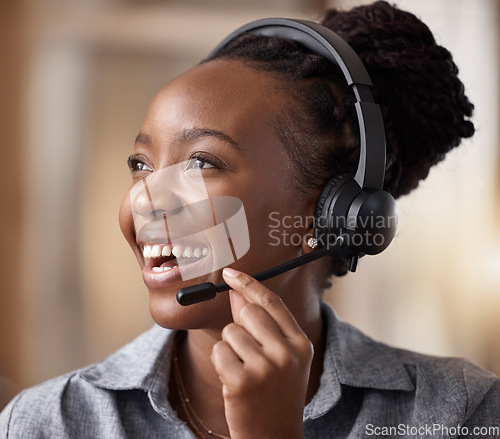 Image of Call center, black woman and happy in contact us, CRM and headset with mic and communication. Customer service consultant, female and smile in telemarketing sales vision and help desk agent in office