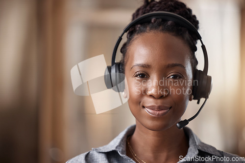 Image of Customer support, black woman and portrait in call center, contact us and CRM with headset, face and mockup space. Closeup, consultant and female employee in telemarketing, sales and help desk office