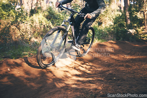 Image of Fitness, bicycle and man outdoor on a nature path with extreme and exercise adventure. Bike, cycling and sport of an athlete with speed and workout for sports training and race action with freedom