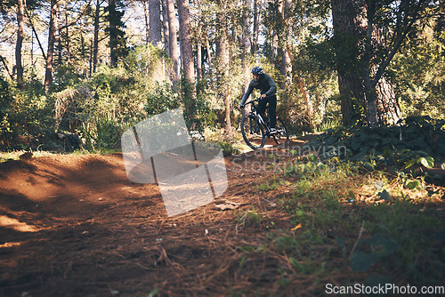 Image of Fitness, bicycle and man outdoor on a hill path with extreme and exercise adventure. Bike, cycling and sport of an athlete with fast speed and nature cycle for sports training and race action