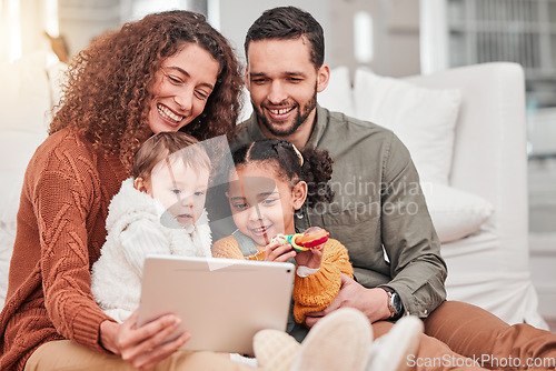 Image of Tablet, sofa and mom, dad and children relax watching movies, cartoon and film together for quality time. Happy family, love and parents with kids on digital tech for educational games or video