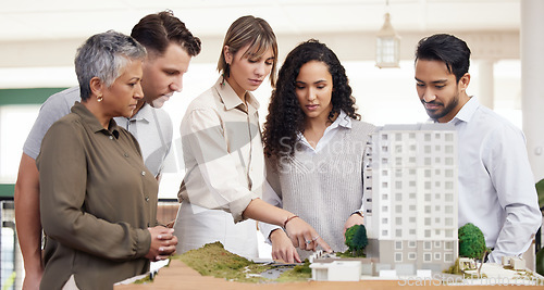 Image of Architecture, apartment model or engineering team in meeting for development project planning. Group collaboration, creative people or communication with senior manager and women for office building