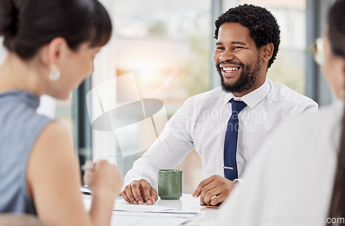 Image of Business, team and black man in meeting, planning and new project with happiness, success or talking. African American male leader, employees or staff brainstorming, smile or discussion for ideas