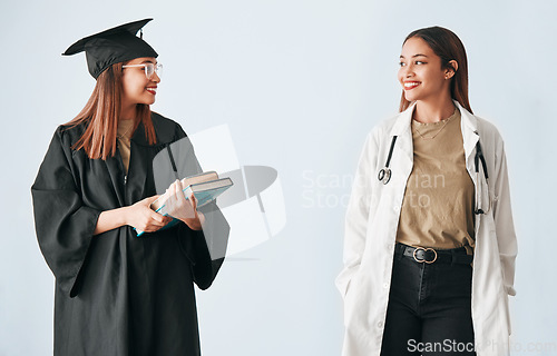 Image of Graduation, medicine and medical student with degree, certificate and diploma achievement isolated in a studio white background. Scholarship, future and happy woman graduate or certified doctor