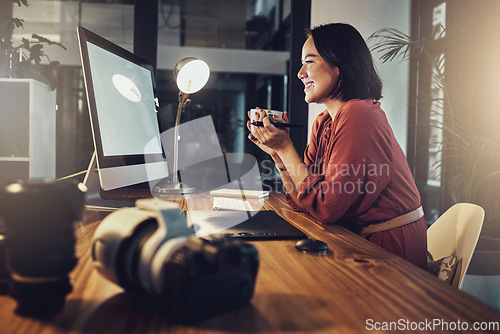 Image of Coffee, computer screen and woman in office with happy online research, digital marketing and business planning. Professional asian person with inspiration, creative ideas and tea at night on desktop