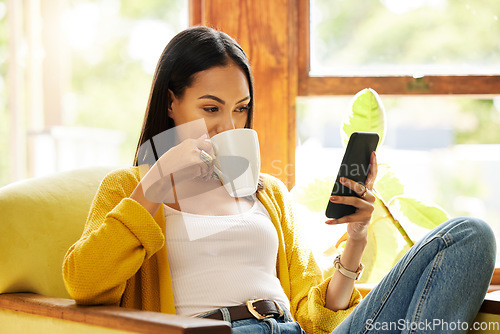 Image of Woman, smartphone and coffee, social media and communication, technology and scroll internet. Online chat, female relax at home with drink, mobile app or games with connectivity, peace and content