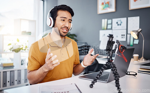 Image of Podcast, tutorial and live stream with a man influencer recording broadcast content in his home office. Internet, vlogger and subscription with a male streamer or creator working in his studio