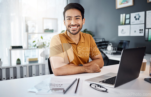 Image of Happy, smile and portrait of a businessman in the office with a laptop working on a corporate project. Happiness, confidence and professional male employee doing research on computer in the workplace