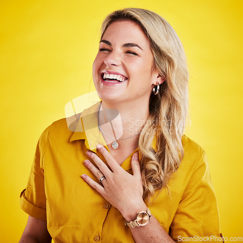 Image of Woman, laughing and happy in studio with joke, comedy or funny reaction against gradient yellow background. Comic, relief and female laugh, relax and meme, good mood and happiness while isolated