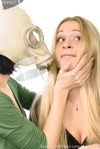 Image of two girls - one in gas mask