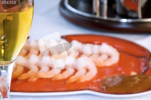 Image of Shrimps on a Plate with the Wine Glass in Focus