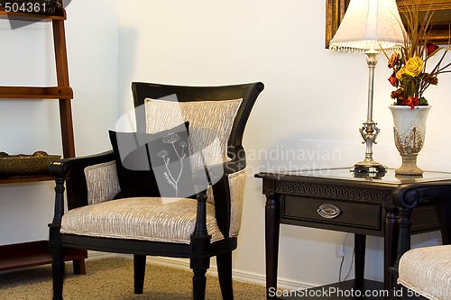 Image of Family Room with Reading Chair and night stand