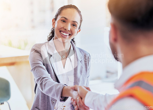 Image of Business people, architect and handshake for partnership, deal or agreement in construction at office. Woman shaking hands with contractor or engineer for b2b, hiring or recruitment for architecture