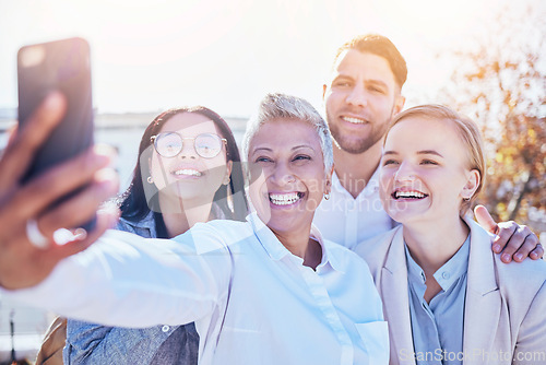 Image of Happy business people, smile and selfie for profile picture, team building or friends in the outdoors. Group of employee coworkers smiling for photo, social media or friendship on work break outside