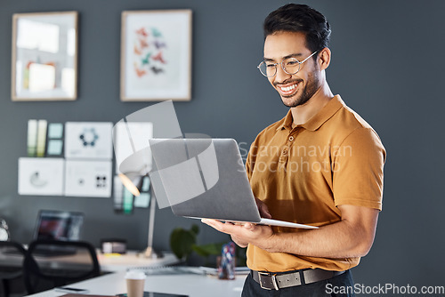 Image of Happy, laptop and corporate man in office smile, confident and excited against blurred wall background. Idea, vision and asian businessman online for planning, goal and design agency startup in Japan