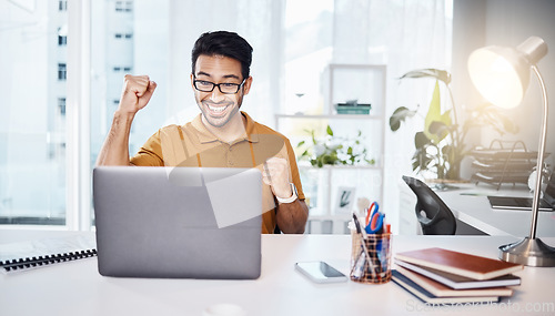 Image of Winner, computer and business man winning with news, results and yes for bonus, promotion or success in office. Celebration, cheers and happy asian person or winner fist pump and celebrate on laptop