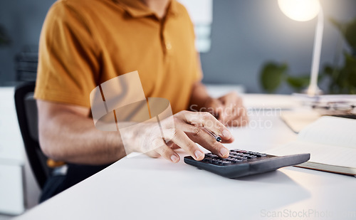 Image of Calculator, finance and business man hands for financial budget, profit check or accounting in office at night. Person or startup entrepreneur in closeup calculating numbers for taxes, debt or growth