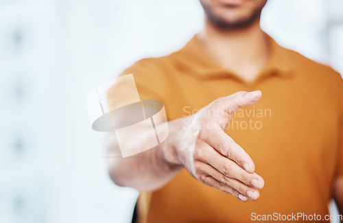 Image of Professional, greeting and businessman with a handshake gesture for a welcome, deal or partnership. Corporate, office and male employee reaching out a hand for shaking hands in agreement in workplace