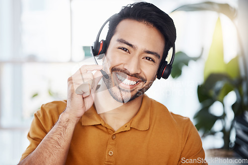 Image of Man with smile in portrait, call center employee and contact us with headset and microphone, CRM and help desk agent. Happy male consultant, communication and tech, customer service job and telecom