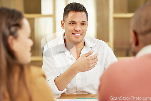 Image of Business man, teamwork and meeting with employees in office for planning, discussion and management. Happy male worker talking to group for collaboration, conversation and startup project proposal