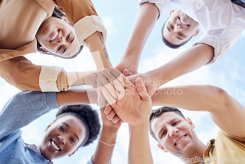 Image of Below circle, hand stack and business people with support, smile and portrait for goal motivation. Men, women and hands together for solidarity, diversity and happiness with team building at job