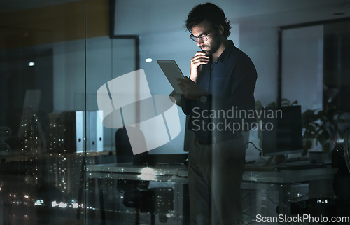 Image of Business man, tablet and thinking in office, problem solving or looking for solution by window with city lights at night. Technology, idea and professional person with touchscreen to focus on reading
