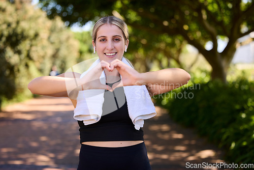 Image of Fitness, heart hands or portrait of happy woman in park for running exercise or workout for body health. Heart sign, self love or active girl athlete runner in sports training for wellness in nature