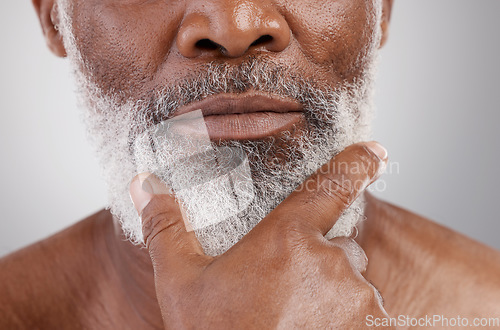 Image of Senior man, closeup and beard in studio for skincare, grooming and beauty routine on grey background. Facial, hair and elderly male relax with cosmetics, treatment and dermatology or moustache growth