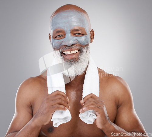 Image of Skin care, cleansing face mask and portrait of black man with smile, happiness and anti ageing clay spa treatment. Dermatology, cosmetic process and skincare, mature model in charcoal facial routine