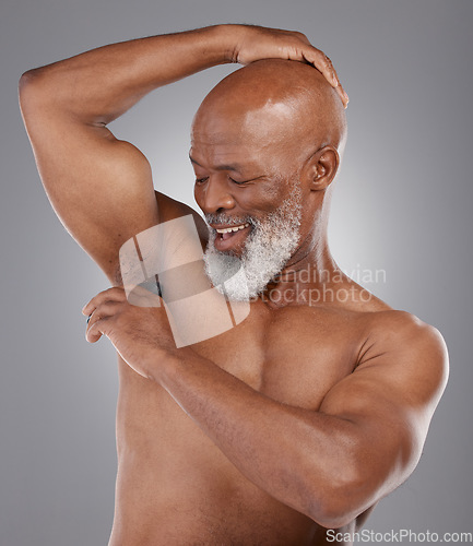 Image of Cosmetics, deodorant and black man with skincare, routine for grooming and guy against dark studio background. Mature male, happy person and senior citizen with hygiene product, hygiene and fragrance
