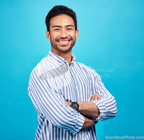 Image of Portrait of happy man in shirt, blue background and positive attitude with smile on face isolated on studio backdrop. Confidence, happiness and professional male model with pride and mockup space.