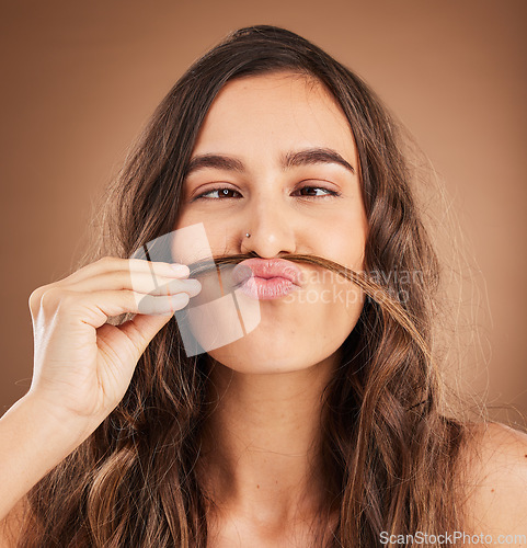 Image of Hair care, comic mustache and face of woman for wellness, hairstyle and health on studio background. Salon aesthetic, hairdresser and silly girl with cosmetics, keratin treatment and natural beauty