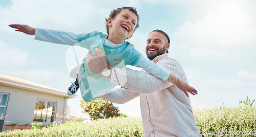 Image of Airplane game, family and father playing with child or kid outside the home or house lawn backyard together. Smile, happy and dad or single parent carrying son flying and bonding with freedom