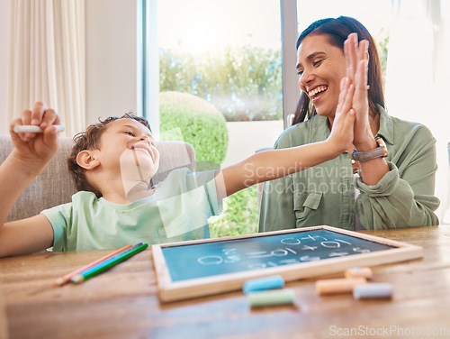Image of High five, mother and child education, learning and teaching math, numbers and home development goals or support. Yes, success and celebration hands of family, mom and happy kid with chalkboard