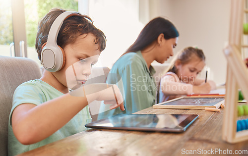 Image of Elearning, home school and child with tablet, headphones and online class with video lesson or educational mobile app. Future education, internet and digital classroom for kindergarten kids with mom.