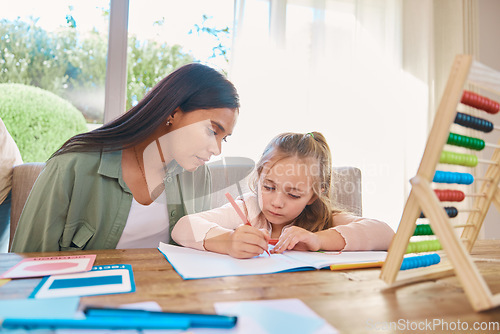 Image of Writing, helping and mother with girl for home school education, language support and creative learning. Math, numbers and family, biracial mom or woman teaching child, drawing and notebook for focus